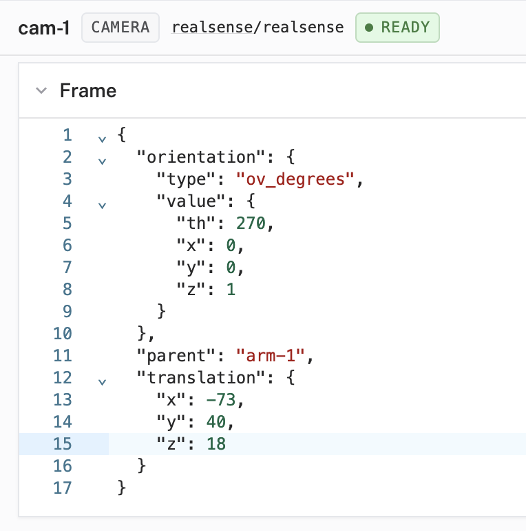 The Frame editor JSON for cam-1 with parent arm-1 and a wrist-mount translation.